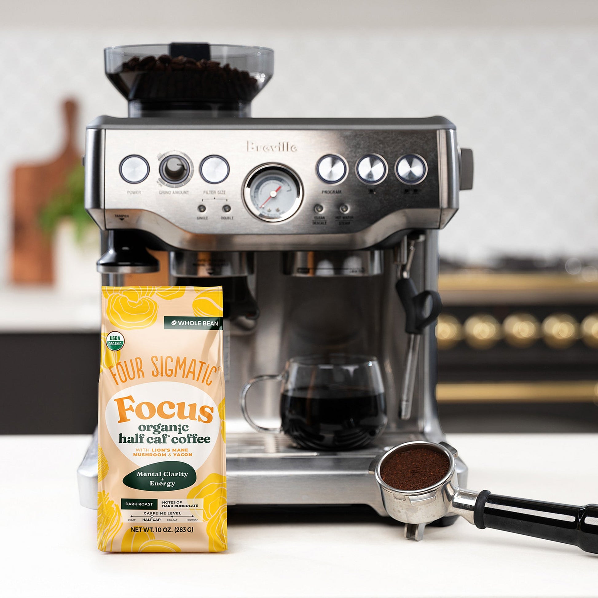 focus-half-caf-whole-bean-coffee-d8 Focus_Org_Dark_Roast_High_Caf_Kitchen_Pour_Woman_4_47b71a0c-c7fc-40fd-a2bc-fa7389dfb410.jpg